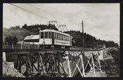 Trikk fra Gråkallbanen på Hoemsbrua på Byåsen.1924-1930. Ukjent/Nasjonalbiblioteket