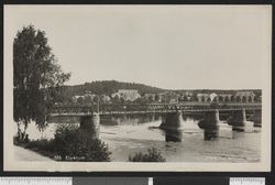 Den gamle veibrua over Glomma 1920. Ukjent/Nasjonalbibliotekets fotosamling