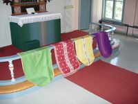 Antemensale i Moland kyrkje vevd av Signe Tveiten. Foto 2004 ved ei registrering