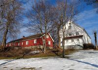 Asker prestegård fotografert fra Asker kirkegård i mars 2022. Foto: Stig Rune Pedersen