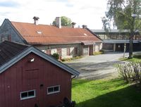 Det norske myntverket, tidligere Den kongelige mynt, ligger ved enden av Nybrua. Foto: Stig Rune Pedersen