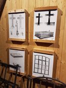 Plansjer med produkter fra jernverket, utstilt på Eidsfoss jernverksmuseum. Foto: Siri Iversen (2018).