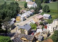 Den store bygningen øverst i biletet i enden av Folkestadgata er Fyresdal Sparebank. Widerøe foto frå 1961