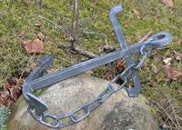 Anker i metall påsatt gravminne på Vår Frelsers gravlund.