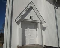 Hillestad kirke, inngangsparti, tårnfoten. Foto: Stig Rune Pedersen