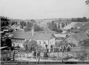 Dal med bebyggelsen og den nye Dal bru fra 1864 i bakgrunnen. Kilde: Jernbanemuseet