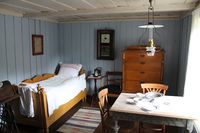 Et av rommene i huset. Hvert rom ble i en periode leid ut som en egen leilighet, med felles kjøkken. Foto: Chris Nyborg (2013)