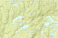 kart som viser beliggenheten rett sør før Bjørvannet og like ved kommunsegrensa mellom Øvre Eiker og Flesberg.