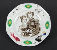 Reparert tallerken fra forsida. Portrett av Josephine og Oscar I. Fra Maihaugen.