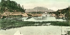 Kyrkjevatnet uggdal tysnes kommune kolorert postkort ca 1900.jpg