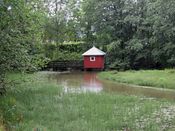 Møllerdammen fra 1923 ligger like nedenfor Reidvintunet. Foto: Stig Rune Pedersen