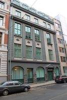 Nedre Vollgate 20 i 2013. Bygget vart oppført for Hjemmenes Vel i 191200154 b1913. Det er teikna av Ingvar O. Hjort.