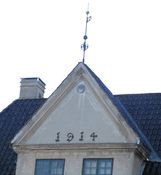 Detalj av museumsbygning på nordsiden av «Torget», oppført i 1914 Foto: Stig Rune Pedersen