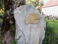 Palett på en kunstmalers grav, Borre kirkegård. Foto: Stig Rune Pedersen (2013).