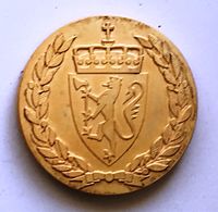 Regjeringens innsatsmedalje 2015 bakside.