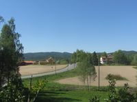 Sørkedalsveien sett fra Sørkedalen kirke. Foto: Stig Rune Pedersen (2012).