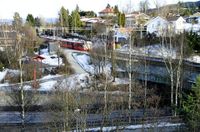 Sagdalen stasjon ville fått adressen Strømsveien 128. Sagelva i forgrunnen. Foto 2015.