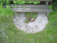 Gammel møllestein foran stabburstrappen. Nordre Stalsberg hadde to egne møller ved Sagelva.